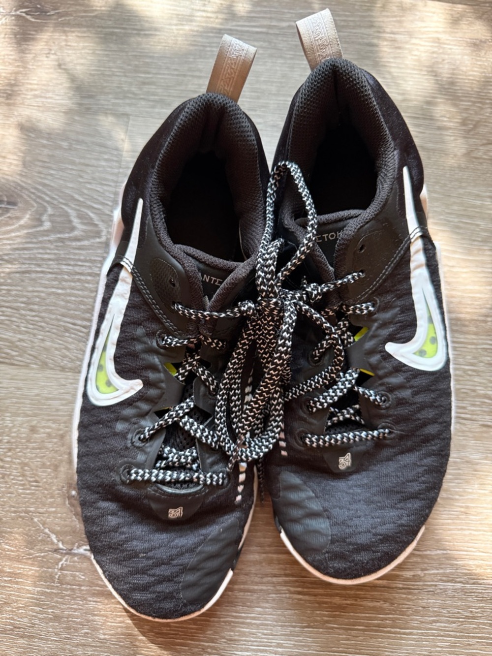 Nike Black and White Running Shoes with Lime Swoosh Accents